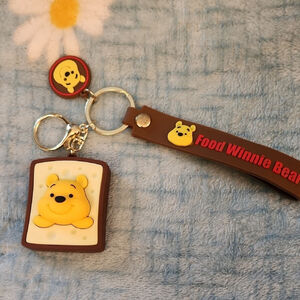 Winnie the Pooh Keychain with a Brown Wrist Strap